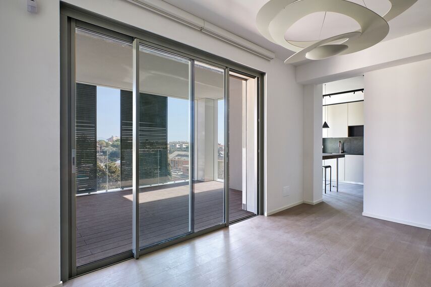 BriseSoleil 40 Solar Shading, CS 77 Hidden Vent Windows and SlimPatio 68 Sliding & Folding - Palazzo Arbà located in Genoa, Italy