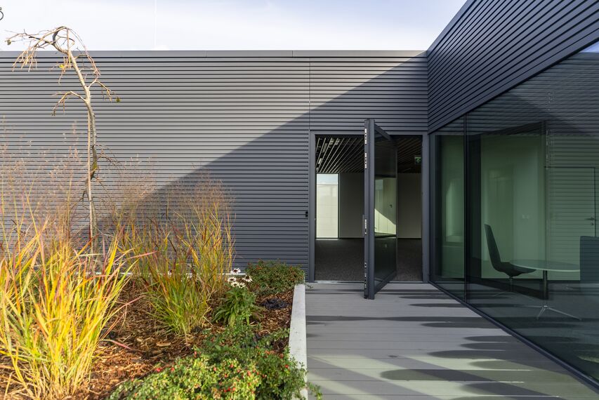 ConceptWall 60 Façades, ConceptWall 50 Façades, Paralline Cladding, ConceptSystem 59Pa Windows, HiFinity Sliding & Folding, Fixscreen Minimal Solar Shading, MasterPatio Sliding & Folding, CW 50-HI Façades, CW 60-HI Façades, MasterLine 8 HI Windows, CW 50-FP Façades, MasterLine 8-HI Doors, MasterLine 8 Pivot Door Doors and CS 77 Fire Proof Doors - Reynaers Central Europe Campus located in Przeszkoda, Poland