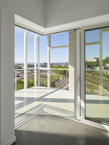 ThermoSystem 68 Windows and ConceptPatio 68 Sliding & Folding - Tour Ycone located in Lyon, France