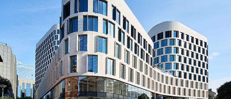 Front view of the Quatuor commercial building in Brussels, Belgium.