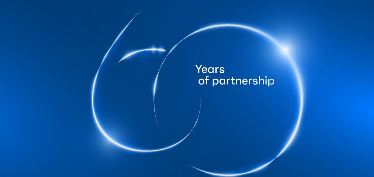 60 years of partnership visual on blue background